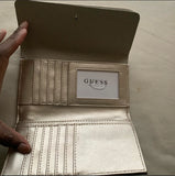 Guess clutch